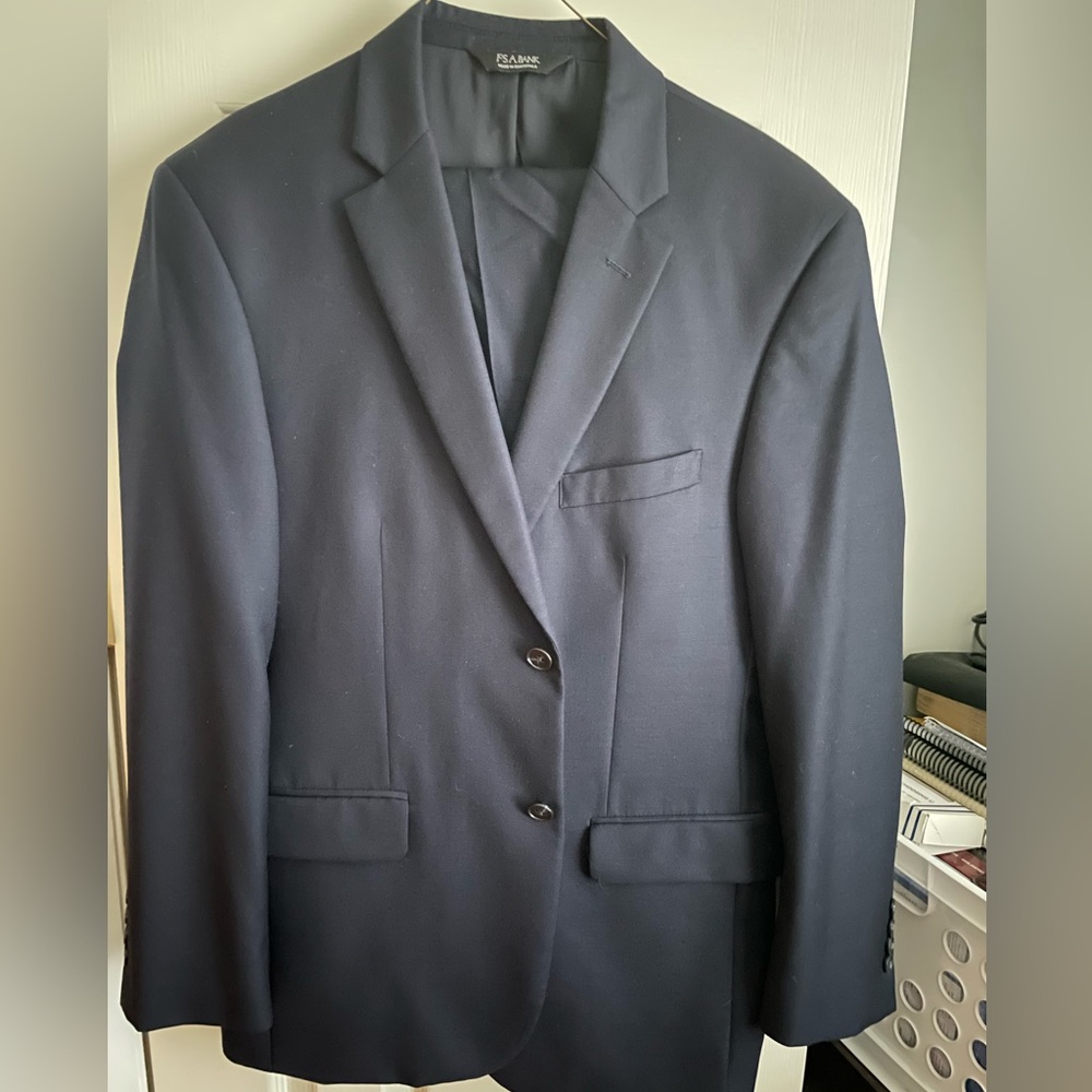 Joseph A Bank, Tailored fit, traveler addition, navy blue suit.